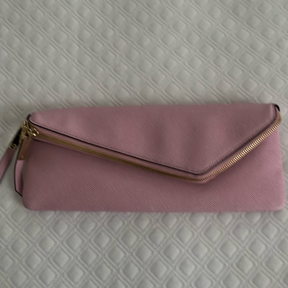 Henri Bendel pink leather clutch with shoulder strap